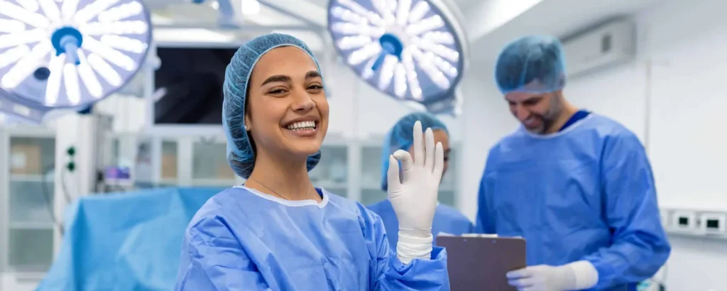 Medical professionals in surgical environment.